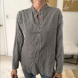 Closed grey and white stripped Marian bottom down